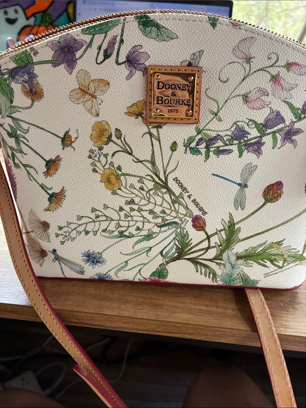 Dooney & Bourke Cream Floral Dome Crossbody with Gold Plaque and Tan Straps